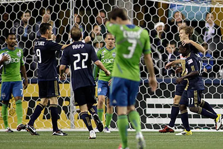 The Union are two points ahead of Kansas City with each team having two games to play. (Ted S. Warren/AP)