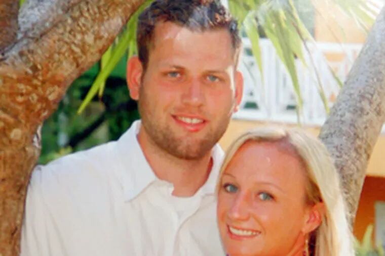 The honeymoon photo of Officer John Pawlowski, who was gunned down in February 2009 at Broad Street and Olney Avenue, and his wife, Kim. She was pregnant at the time, and delivered a boy, named after his father, on Thursday, June 11.