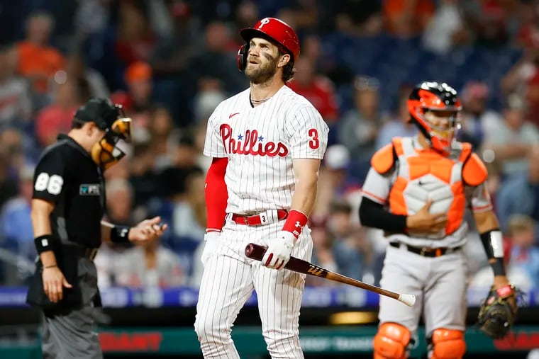 The Phillies' Bryce Harper reacted after striking out swinging during the fourth inning against the Baltimore Orioles on Monday.