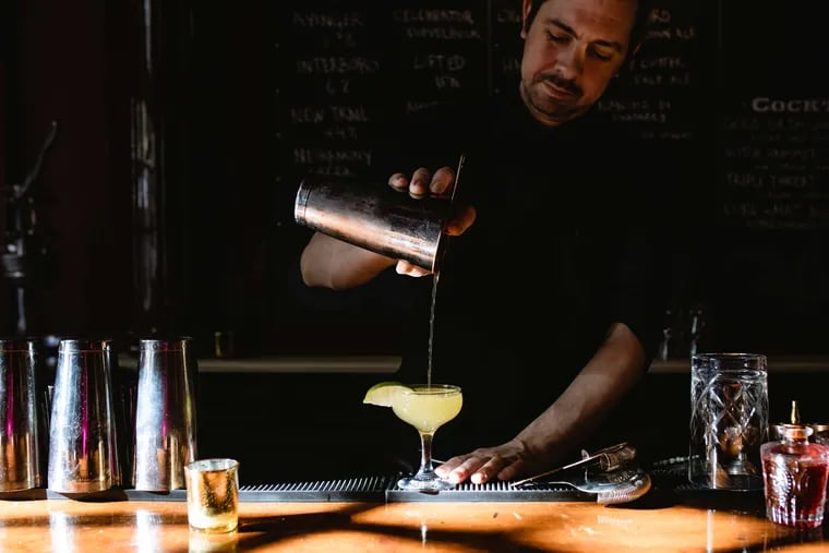 Bar manager Bohdan Darway pours a cocktail at the Hayes, a new bar from chef Townsend Wentz in Washington Square West.