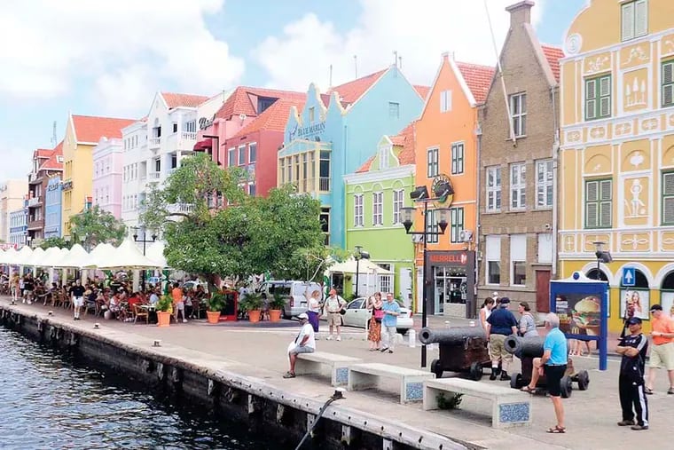The colorful pastel-colored buildings dominate the Punda neighborhood in the heart of Willemstad on the island of Curacao. The buildingts date fromt he 17th and 18th centuries. The neighborhood is a World Heritage site. (Bob Downing/Akron Beacon Journal/MCT)