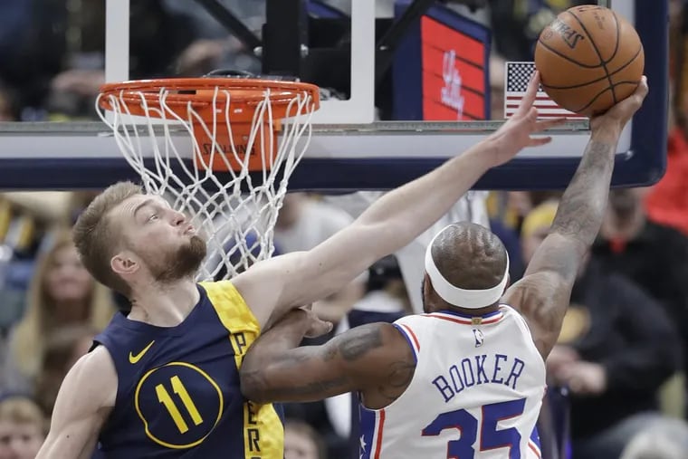 Sixers forward Trevor Booker gets his shot blocked by Pacers big Domantas Sabonis in the SIxers’ 100-92 loss.