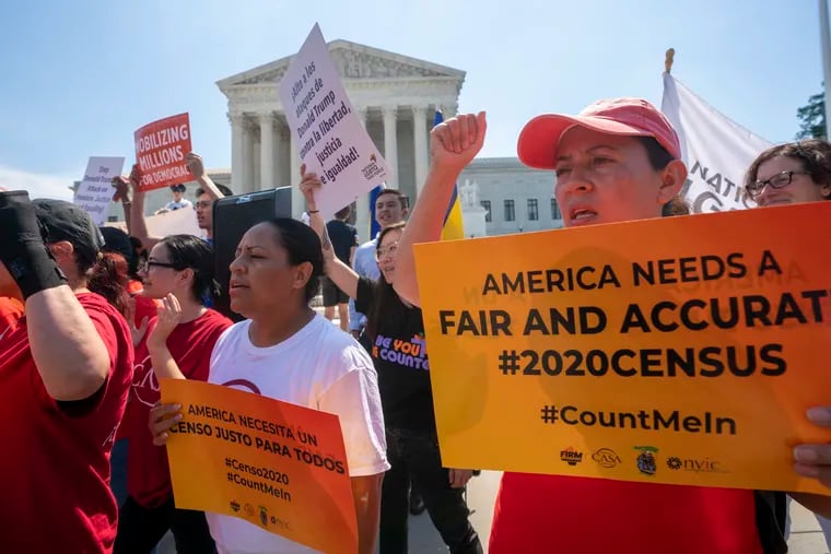 FILE - In this June 27, 2019, file photo, demonstrators gather at the Supreme Court as the justices finish the term with key decisions on gerrymandering and a census case involving an attempt by the Trump administration to ask everyone about citizenship status in the 2020 census, on Capitol Hill in Washington. The Justice Department said Tuesday that the 2020 Census is moving ahead without a question about citizenship.