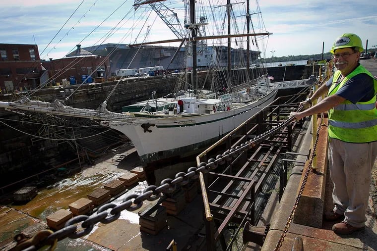 Philadelphia Ship Preservation Guild president Al Ponessa with the tall ship Gazela, in dry dock at the Philadelphia Navy Yard. The Gazela, built in 1901, is Philadelphia’s official tall ship. (ALEJANDRO A. ALVAREZ/Staff Photographer)
