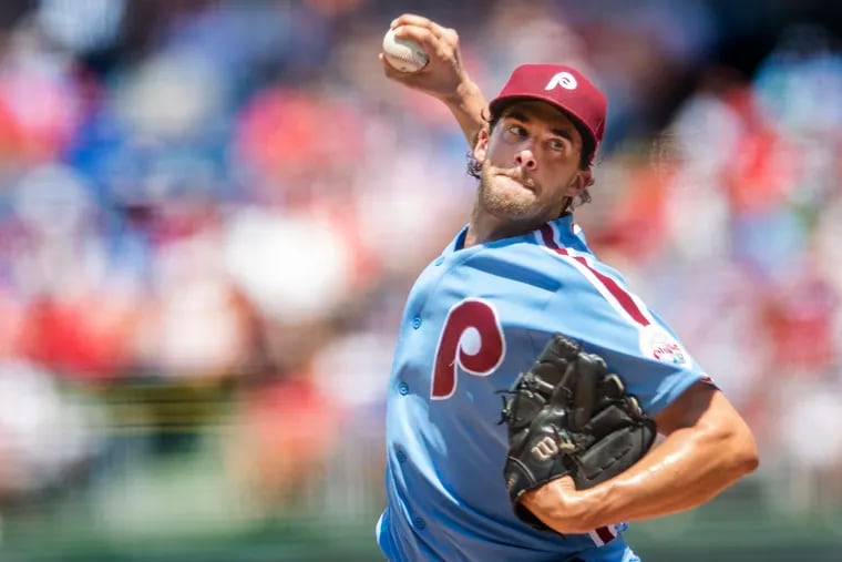 Philadelphia Phillies' Aaron Nola pitches during the 1st inning of the team's baseball game against the Washington Nationals, Sunday, Aug. 7, 2022, in Philadelphia.
