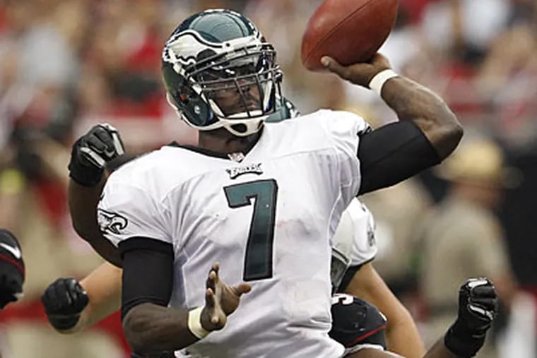 "It's something I know I can get corrected," Michael Vick said about turnovers. (Ron Cortes/Staff Photographer)