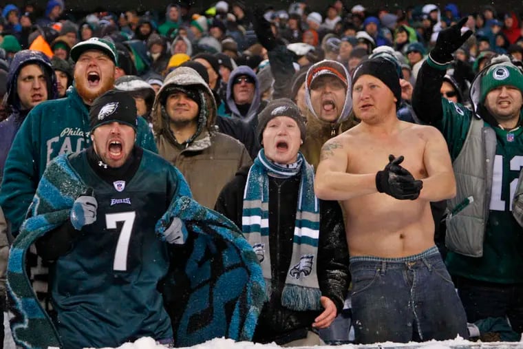 Eagles fans bare their emotions after  LeSean McCoy’s 57-yard touchdown run in fourth quarter. (Ron Cortes / Staff Photographer)