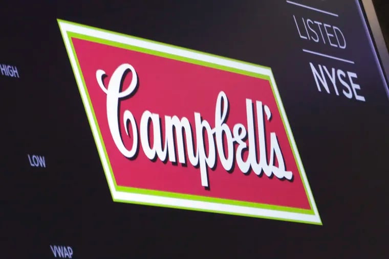 The logo for Campbell Soup Co. appeared above a trading post on the floor of the New York Stock Exchange in May 2018. The company reported earnings Wednesday. (AP Photo/Richard Drew, File)