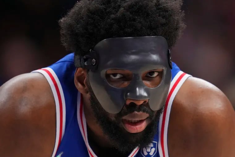 Joel Embiid of the Philadelphia 76ers looks on against the Miami Heat in the first half during Game Three of the 2022 NBA Playoffs Eastern Conference Semifinals at the Wells Fargo Center on May 6, 2022 in Philadelphia, Pennsylvania.