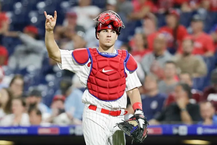 Phillies catcher J.T. Realmuto signals to his teammates during against the Atlanta Braves on Sept. 9.