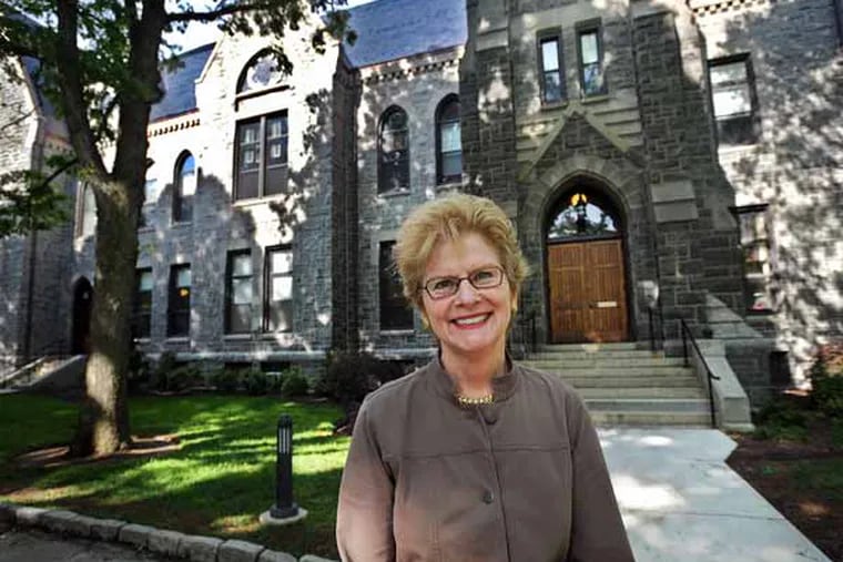 Jane Dammen McAuliffe, President of Bryn Mawr College, in front of Taylor Hall where the president's, dean's and other administrative offices are located. ( Sharon Gekoski-Kimmel / Staff Photographer )