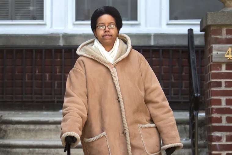 Adrianne Gunter walks outside her Philadelphia apartment with a help of a steel cane, due to her Multiple Sclerosis condition. Wednesday, January 3, 2018. Gunter who waited 788 days for a hearing in Philadelphia, all while her Multiple Sclerosis worsened and she continued to be unemployed and dependent on her motherÕs in between jobs. The Social Security Administration says it doesnÕt have enough judges and support staff to keep up with the pace of applications and appeals.