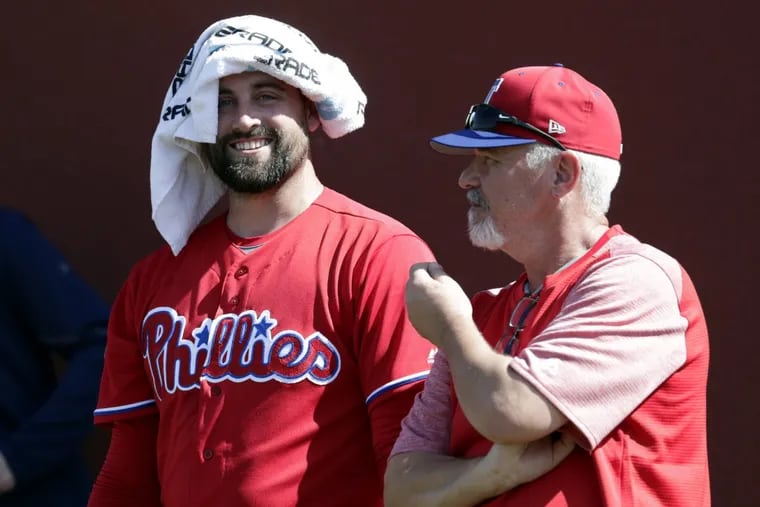 Phillies reliever Pat Neshek (left), here talking with pitching coach Rick Kranitz, expects to be used differently out of the bullpen this season.
