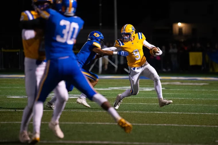 Downingtown East's Connor Noble (No. 9), shown earlier this season vs. Downingtown West, has helped the Couhars to a 9-1 record and a share of the Ches-Mont National title.