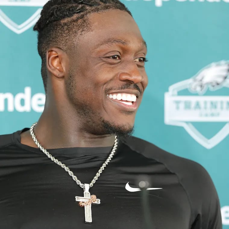 Eagles wide receiver A.J. Brown smiles as he talks with reporters after practice at the NovaCare facility in Philadelphia, Pa. on Sunday, Aug. 20, 2023.