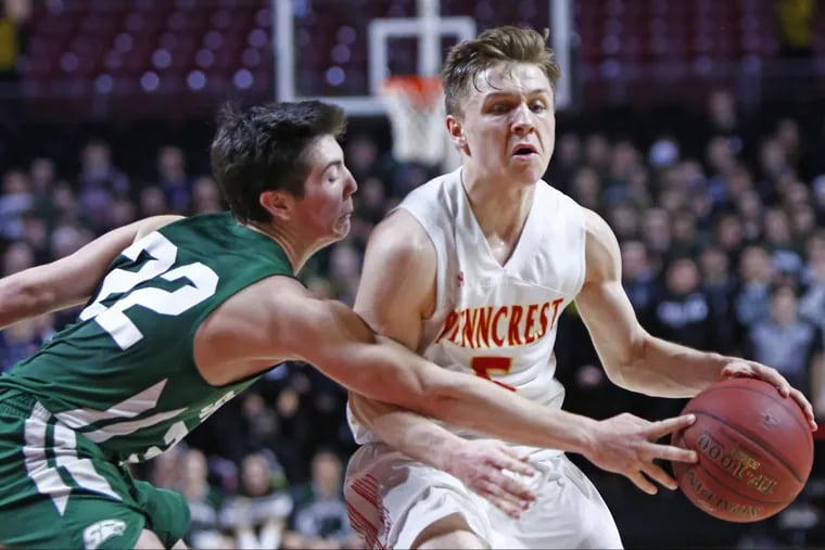 Penncrest guard Justin Heidig is defended closely by David Angelo of Bishop Shanahan during the third quarter of the District 1 Class 5A championship game Saturday, March 3, 2018, at the Liacouras Center at Temple. Penncrest went on to win, 50-28.