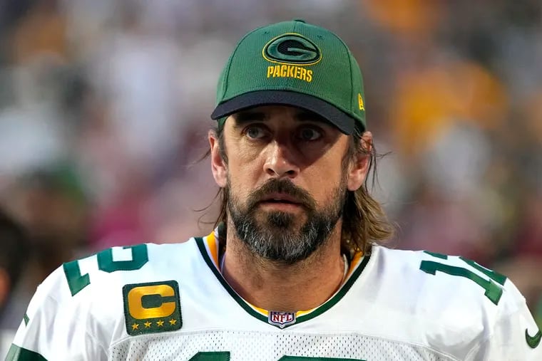 Green Bay Packers quarterback Aaron Rodgers (12) is shown during the first half of an NFL football game against the Arizona Cardinals, Thursday, Oct. 28, 2021, in Glendale, Ariz. Rodgers tested positive for COVID-19. (AP Photo/Rick Scuteri)