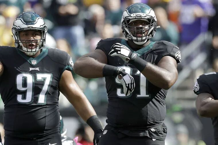 Eagles defensive tackles (from left) Destiny Vaeao and Fletcher Cox on the field against the Vikings on Sunday, Oct. 23, 2016.