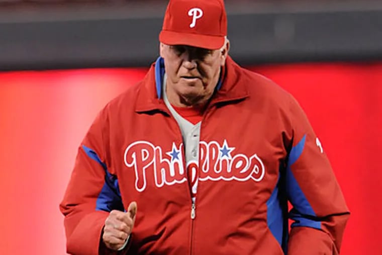 Charlie Manuel recently intimated that some of his core guys may no longer be playing for the right reasons. (Jim Mone/AP Photo)