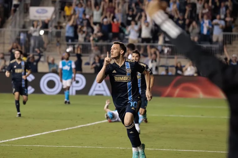 Dániel Gazdag celebrates after forcing the own goal that won the game for the Union.