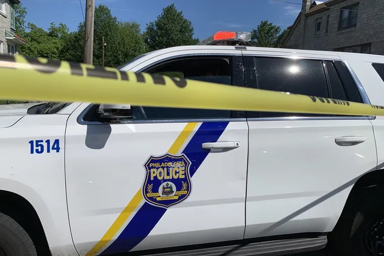 A Philadelphia Police car at a crime scene.