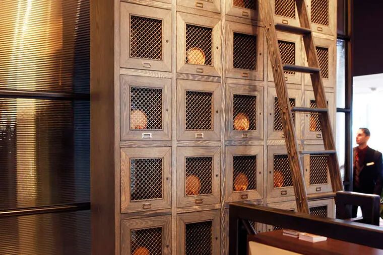 Private bourbon locker at the new Bank & Bourbon restaurant in the Loews Philadelphia. A barrel-aging program allows customers to blend their own.