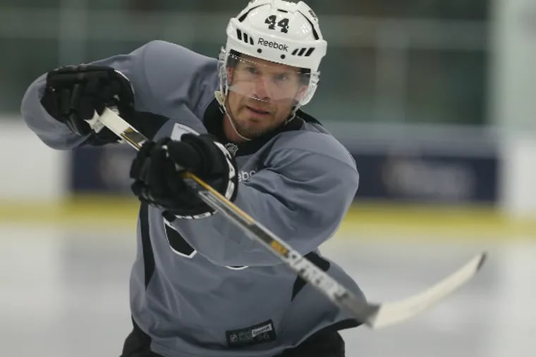 Kimmo Timonen goes through his on-ice workout, skating for the first time since last spring. (David Maialetti/Staff Photographer)