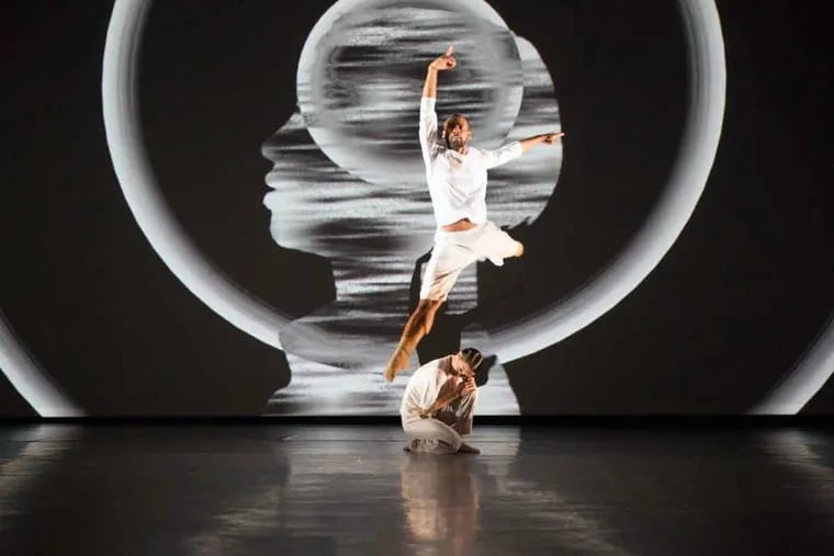 In Matthew Neenan's "Identity Without Attribute," performed by BalletX, Gary W. Jeter II leaps and Caili Quan crouches.