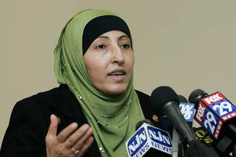 Faten Shnewer speaks to the media in federal court in Camden on Monday after her son, Mohamad Ibrahim Shnewer, and four other Muslim immigrants accused of scheming to massacre U.S. soldiers at Fort Dix were convicted of conspiracy. (Mel Evans/AP Photo)