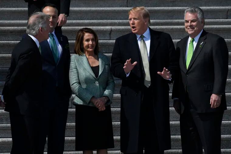 President Donald Trump, second from right, talks with, from left, Rep. Richard Neal, D-Mass., Irish Prime Minister Leo Varadkar, House Speaker Nancy Pelosi of Calif., and Rep. Peter King, D-N.Y., as he arrives on Capitol Hill in Washington, Thursday, March 14, 2019, to have lunch. (AP Photo/Susan Walsh)