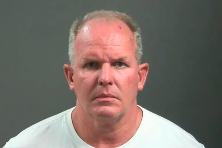 Doug Ramsey has been charged with felony battery after a fight outside a college football game in which he was accused of biting a man’s nose.