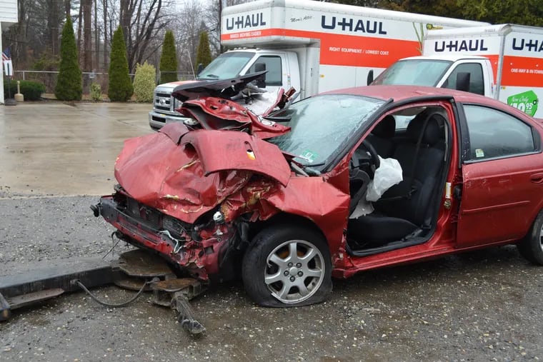 Melinda Baker's Dodge Neon after being hit by a speeding car driven by volunteer firefighter Richard Campbell in January 2018. She received a $4.6 million settlement this month.