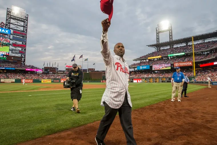 Longtime member of the Phillies, Jimmy Rollins, was honored before the game between the Phillies and the Nationals at Citizens Bank Park on May 4, 2019.   Jimmy lifts his hat to the crowd after taking the field at shortstop for the last time.