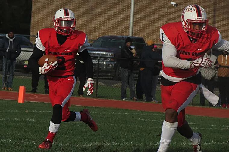Penns Grove's Jamar Johnson runs for a big gain, with fellow running back Tyreke Brown leading the blocking.