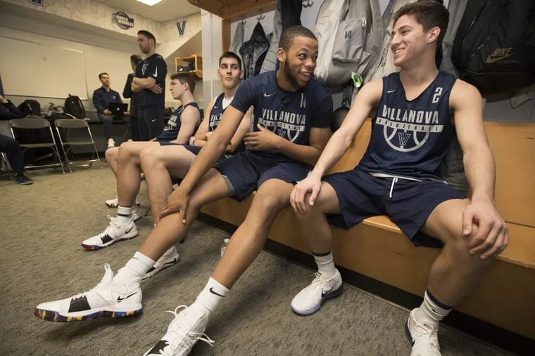 Omari Spellman, center, and Collin Gillespie of Villanova joke in the locker room before their practice session in TD Garden on March 22, 2018. They will face West Virginia in the round of 16 in the NCAA Tournament.