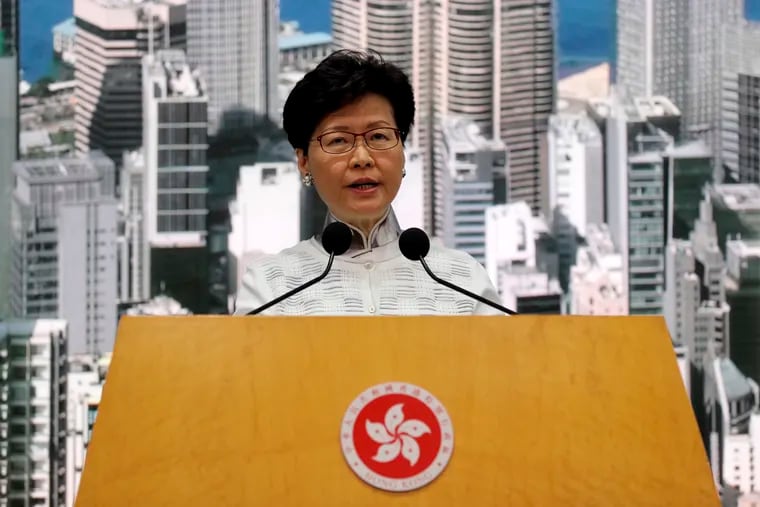 Hong Kong's Chief Executive Carrie Lam speaks at a press conference in Hong Kong Saturday, June 15, 2019. Lam said she will suspend a proposed extradition bill indefinitely in response to widespread public unhappiness over the measure, which would enable authorities to send some suspects to stand trial in mainland courts.
