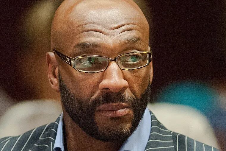Irving Fryar is charged with conspiracy and theft. CLEM MURRAY / Staff Photographer