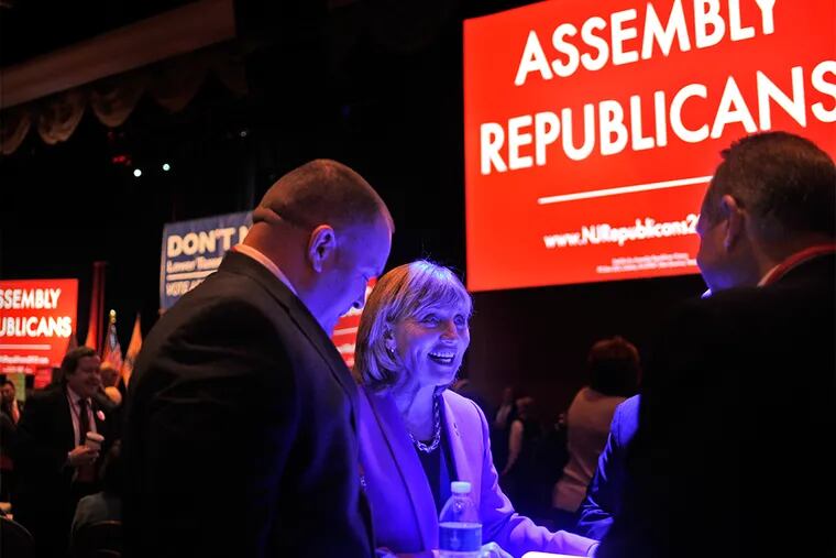 NJ Lieutenant Governor Kim Guadagno works the room as NJ Republicans, including Assembly members up for election next fall, meet in Atlantic City February 2, 2015 to discuss their agenda for 2015.