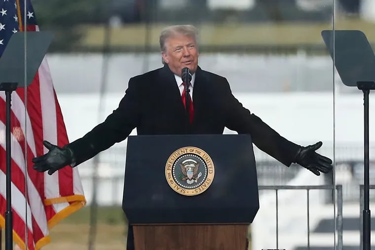 President Donald Trump gestures while speaking to the crowd during Wednesday's rally in Washington.