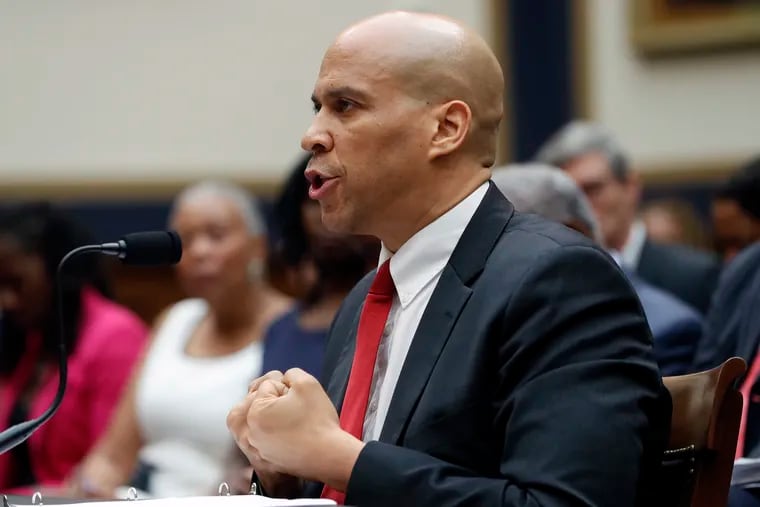 Democratic presidential candidate Sen. Cory Booker (D., N.J.) testifies about reparation for the descendants of slaves during a hearing before the House Judiciary Subcommittee on the Constitution, Civil Rights and Civil Liberties Wednesday. Later in the day, he demanded that former Vice President Joe Biden apologize for comments about working together with past senators who supported segregation.