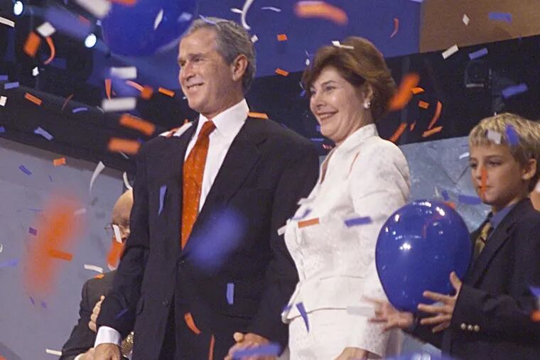 Republican presidential nominee George W. Bush and his wife Laura smile as balloons fall at the Republican National Convention August 3, 2000 in Philadelphia. Despite holding their convention in Pennsylvania, Democratic presidential nominee Al Gore went on to win the state.