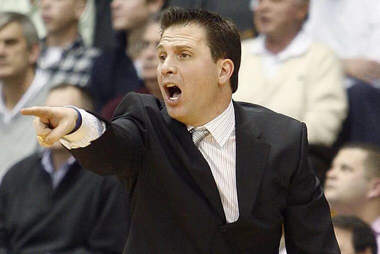 Billy Lange has been an assistant at Villanova and head coach at Navy. Now he's joining the 76ers' staff as an assistant to Brett Brown. (Tom Mihalek/AP file photo)