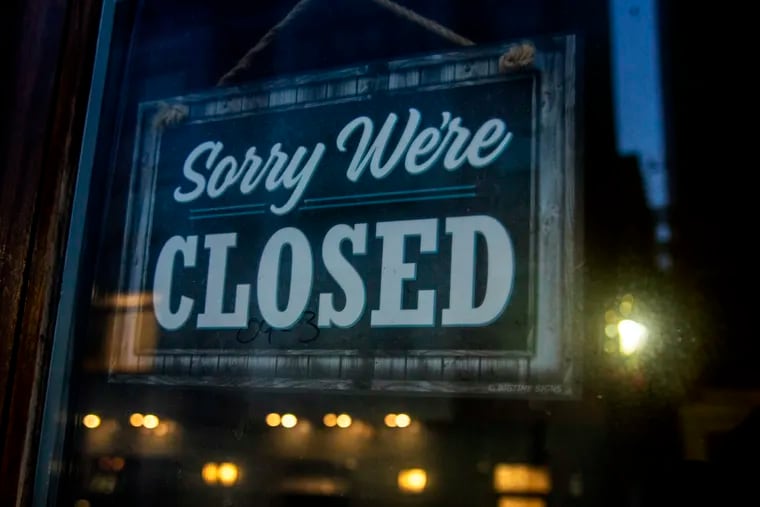 A “closed “sign in the empty Old City General Store in the unit block of South Third Street on Dec. 3. The pandemic and lack of foot traffic are having a devastating impact on the neighborhood.