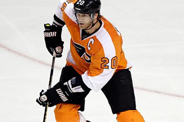 Flyers captain Chris Pronger has concussion-like symptoms and will be out indefinitely. (Matt Slocum/AP)