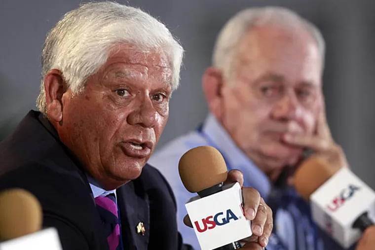 Lee Trevino, who won the U.S. Open at Merion in 1971, and David Graham, who won in 1981, give an interview with reporters at the 2013 U.S. Open Championship on Tuesday, June 11. (David Swanson/Staff Photographer)