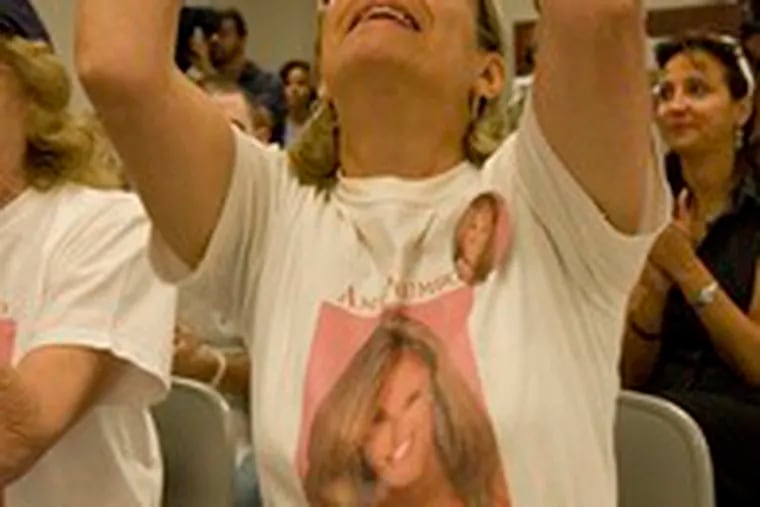 Debbie Krywinski of Middletown, Amy Polumbo&#0039;s aunt, cheering at yesterday&#0039;s news conference as the pageant announced that the reigning Miss New Jersey would keep her crown.