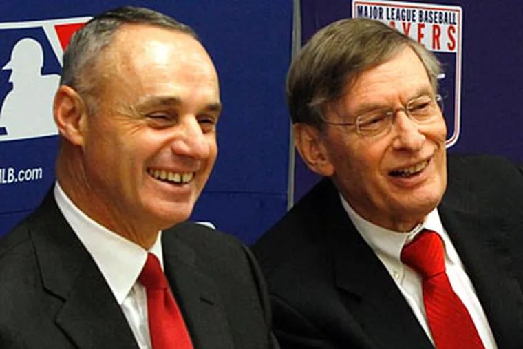 Bud Selig and Vice President of Labor Relations Rob Manfred announced a five-year CBA on Tuesday. (AP)