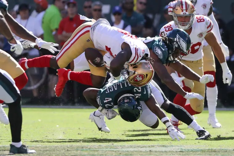Eagles safety K'Von Wallace went helmet-to-helmet with 49ers running back Trey Sermon, which caused a fumble in the fourth quarter Sunday. The ball remained with San Francisco because of the penalty.