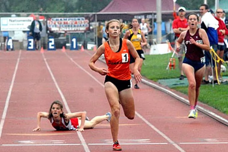 Sara Sargent wins the 3200-meter race in a record-setting time at the Pa. High School Track Championships at Shippensburg University. (April Saul / Staff Photographer)