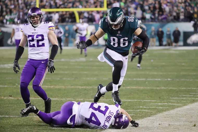 First down catch by Eagles tight end Zach Ertz late in the second quarter, and Minnesota Vikings strong safety Andrew Sendejo, #34 on the ground, during the NFC Championship game between the Philadelphia Eagles and the Minnesota Vikings, Sunday, Jan. 21, 2018, in Philadelphia. DAVID MAIALETTI / Staff Photographer